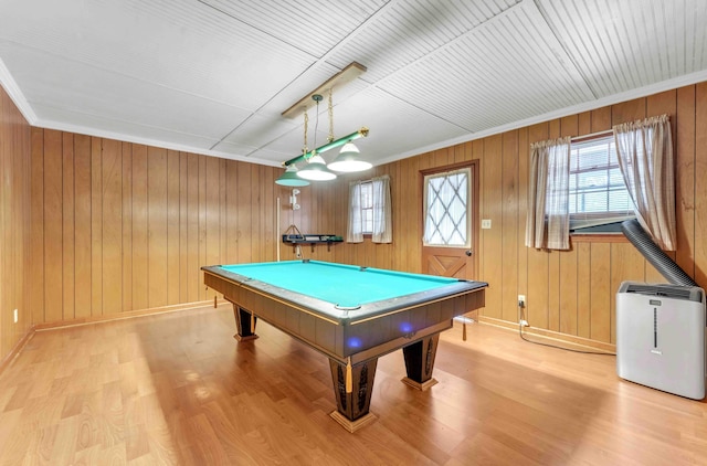 recreation room with ornamental molding, light wood-style floors, billiards, and baseboards