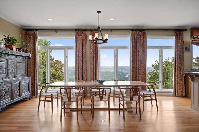 212 N Palisades Dr, Signal Mountain, TN 37377 - dining area with a chandelier, light wood-style floors, ornamental molding, healthy amount of natural light, and recessed lighting