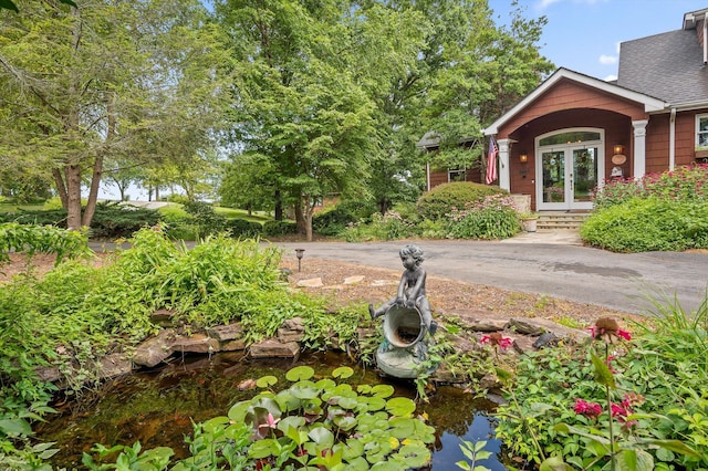 212 N Palisades Dr, Signal Mountain, TN 37377 - view of yard featuring french doors and a garden pond