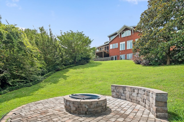 212 N Palisades Dr, Signal Mountain, TN 37377 - view of green lawn with a patio area and a fire pit