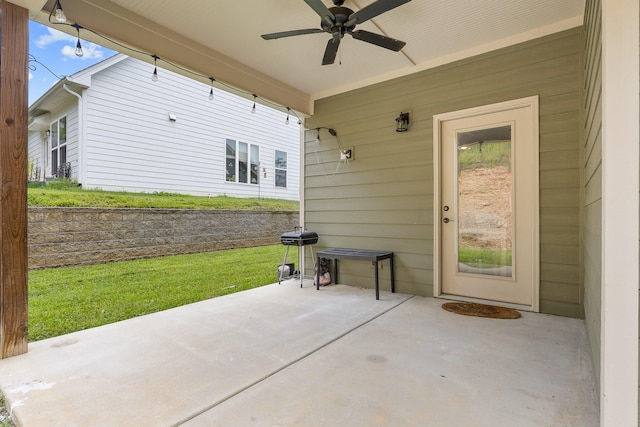 view of patio with ceiling fan