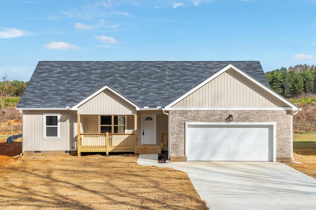 view of front of home featuring a garage and covered porch