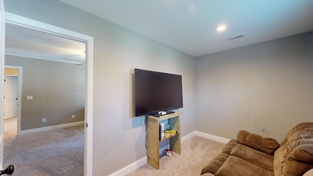 living room featuring light colored carpet