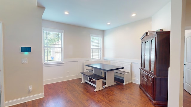 dining area featuring dark hardwood / wood-style floors