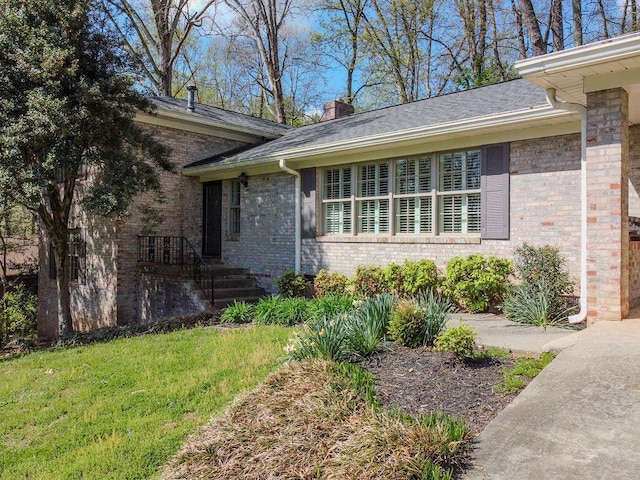 624 Pinecrest Dr, Athens, TN 37303 - doorway to property featuring a chimney, a yard, and brick siding