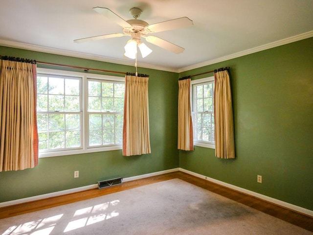 624 Pinecrest Dr, Athens, TN 37303 - unfurnished room featuring visible vents, baseboards, ceiling fan, crown molding, and wood finished floors