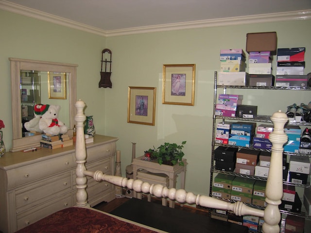 bedroom with ornamental molding