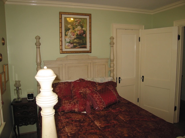 bedroom featuring crown molding