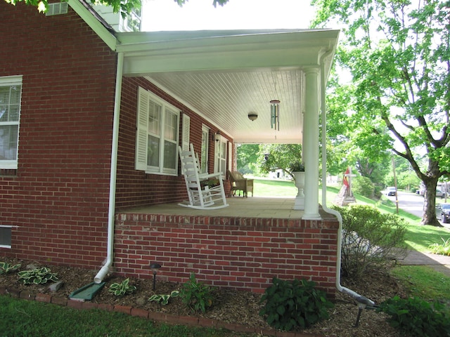 view of home's exterior with covered porch