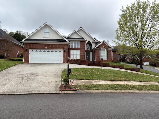 1951 Weston Hills Dr NW, Cleveland, TN 37312 - view of front of home featuring driveway, brick siding, and a front yard