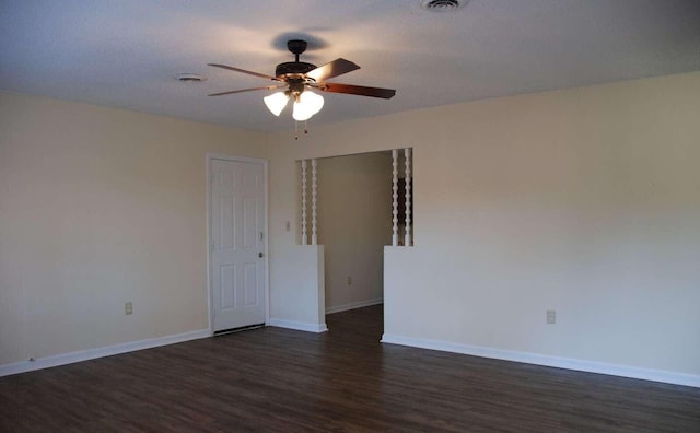 unfurnished room featuring a textured ceiling, ceiling fan, and dark hardwood / wood-style floors