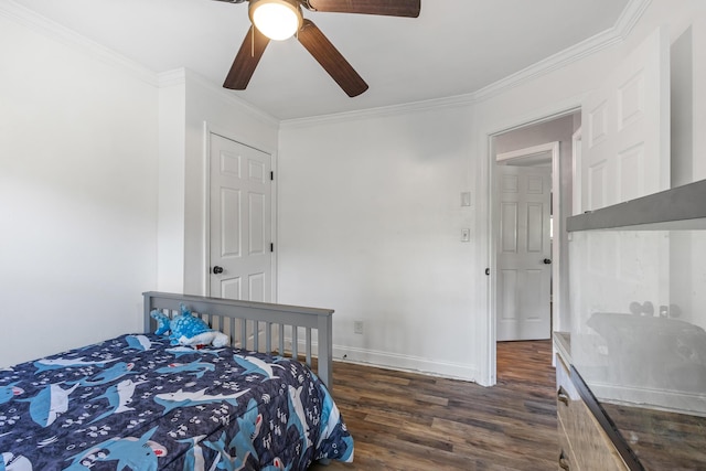 bedroom with baseboards, dark wood-style floors, ceiling fan, and crown molding