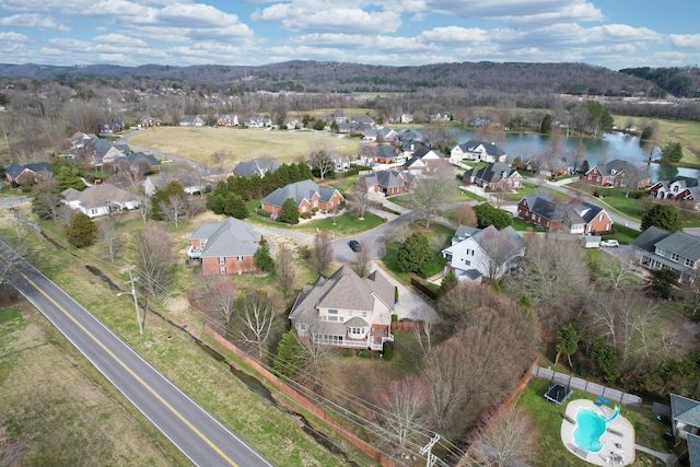 aerial view with a residential view and a water view