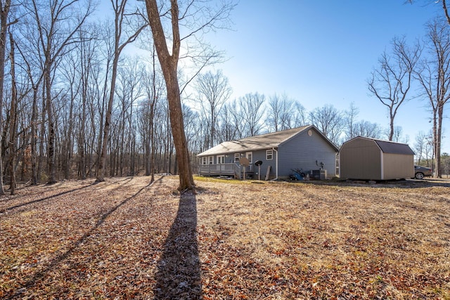 exterior space featuring a storage shed