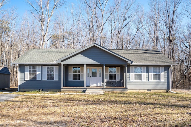 ranch-style house featuring a front yard and a porch