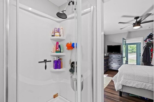 bedroom featuring ceiling fan and dark wood-type flooring