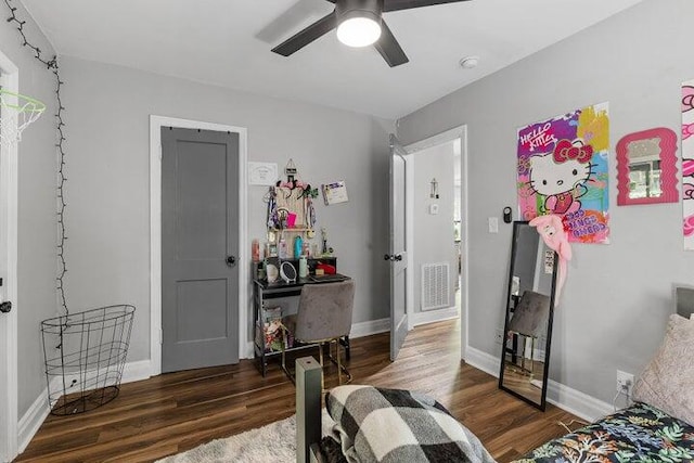 bedroom featuring ceiling fan and dark hardwood / wood-style flooring