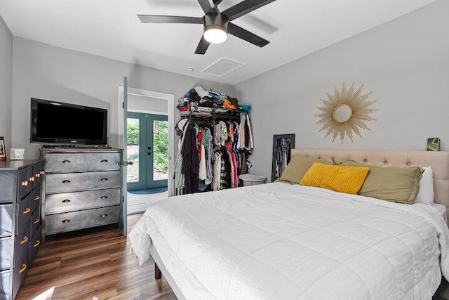 bedroom with ceiling fan, access to exterior, dark wood-type flooring, and french doors