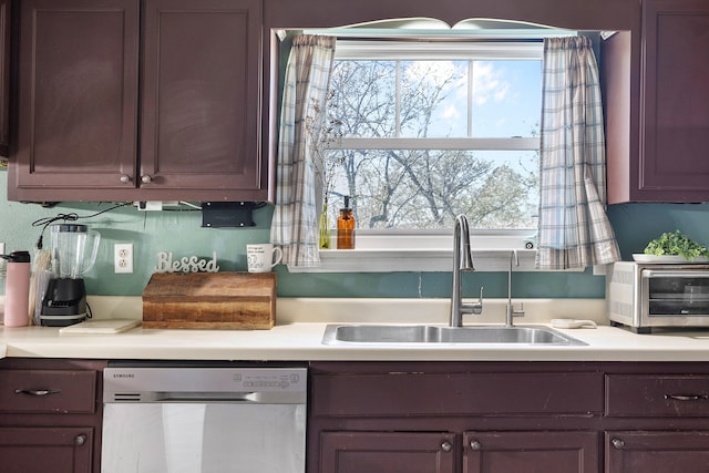 kitchen featuring stainless steel dishwasher and sink