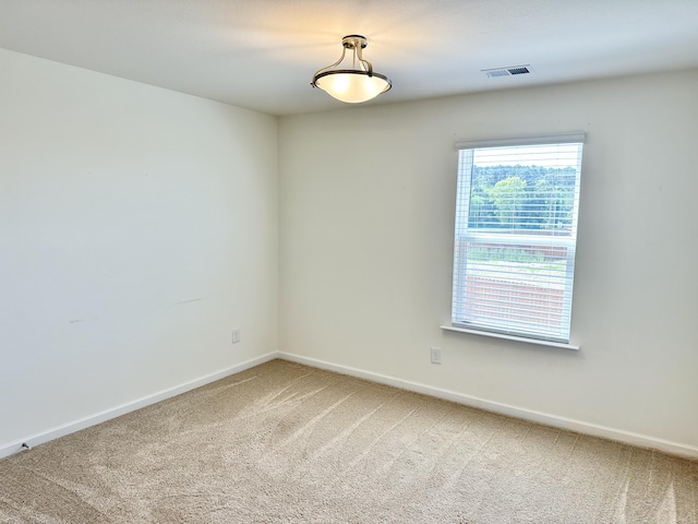 119 Lindsell Rd, Athens, TN 37303 - empty room with baseboards, visible vents, and light colored carpet