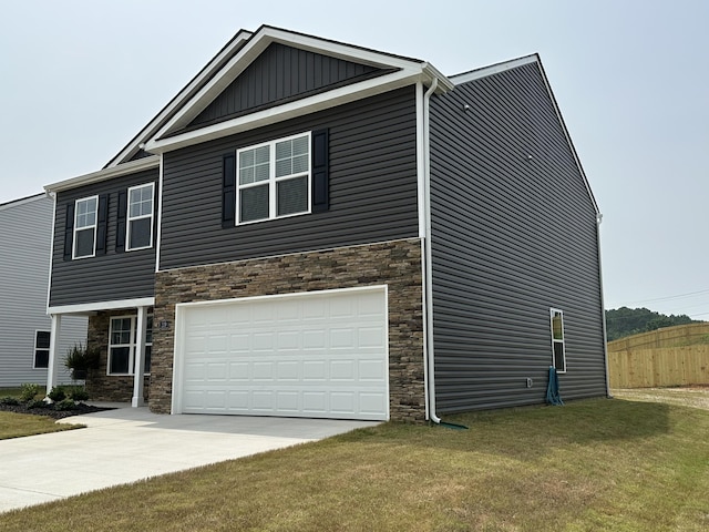119 Lindsell Rd, Athens, TN 37303 - craftsman-style home featuring driveway, stone siding, fence, a front yard, and a garage