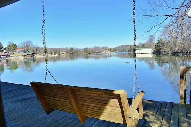 dock area featuring a water view