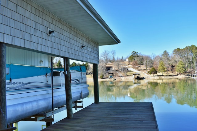 view of dock with a water view