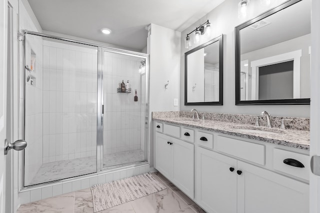 bathroom featuring vanity and walk in shower