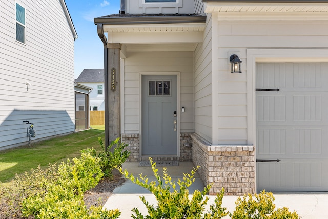 property entrance featuring a garage