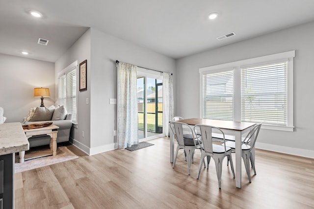 dining room featuring light hardwood / wood-style floors