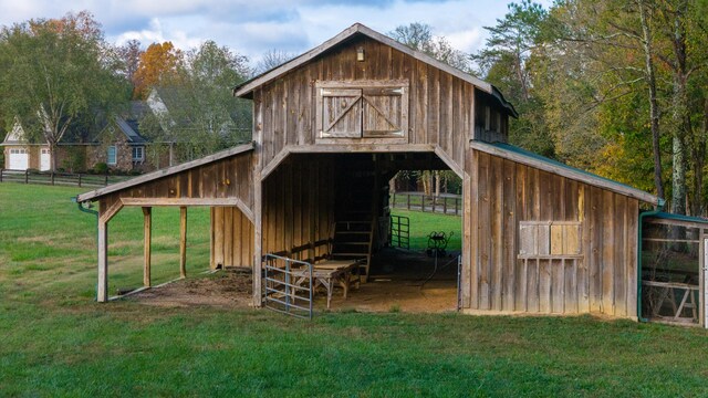 view of outdoor structure with a lawn