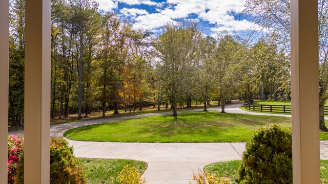 view of home's community featuring a yard