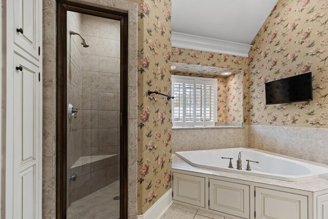 bathroom featuring crown molding and plus walk in shower