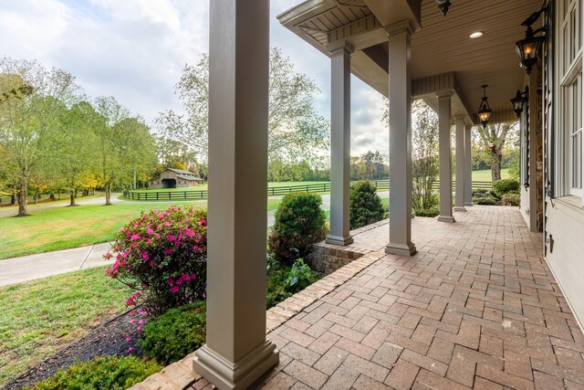 view of patio featuring a porch