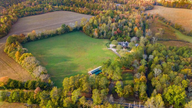 birds eye view of property featuring a rural view