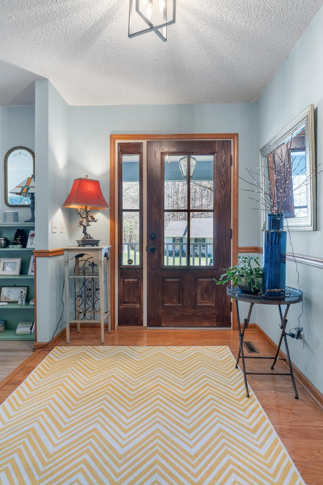 180 Mapleton Forest Dr NW, Cleveland, TN 37312 - entrance foyer with wood finished floors and a textured ceiling