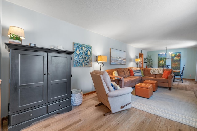 180 Mapleton Forest Dr NW, Cleveland, TN 37312 - living area with a chandelier and light wood-type flooring