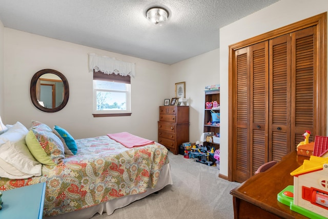 180 Mapleton Forest Dr NW, Cleveland, TN 37312 - carpeted bedroom with a closet and a textured ceiling