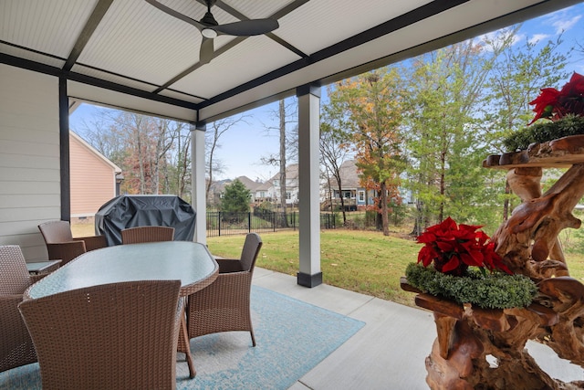 view of patio with area for grilling and ceiling fan