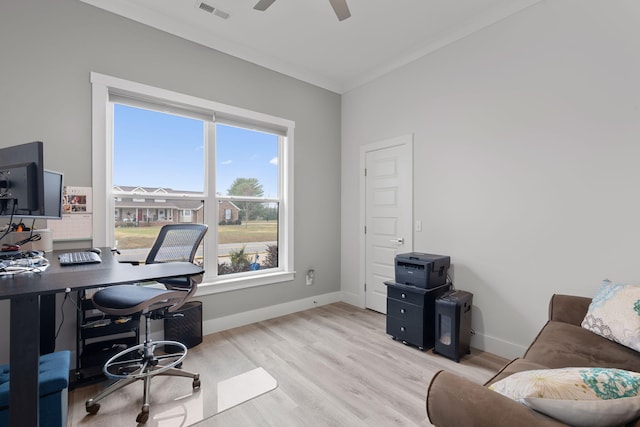 office area with light hardwood / wood-style flooring, ceiling fan, and ornamental molding