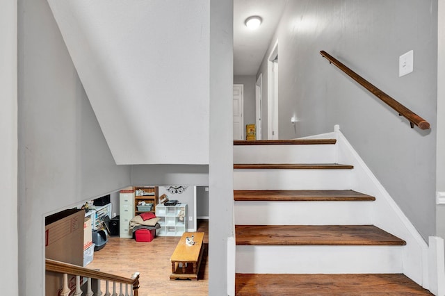 stairway featuring hardwood / wood-style floors