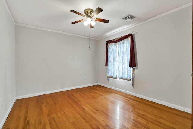 2408 Peerless Rd NW, Cleveland, TN 37311 - empty room featuring visible vents, baseboards, ornamental molding, and light wood finished floors