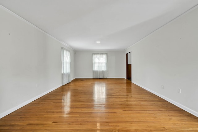 2408 Peerless Rd NW, Cleveland, TN 37311 - unfurnished room featuring light wood-style flooring, baseboards, and ornamental molding
