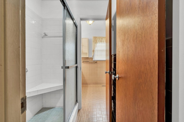 2408 Peerless Rd NW, Cleveland, TN 37311 - bathroom featuring a stall shower and tile walls