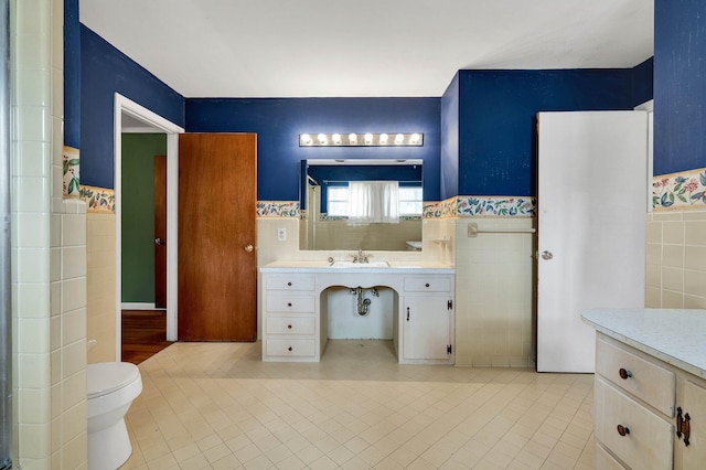 2408 Peerless Rd NW, Cleveland, TN 37311 - full bath featuring tile walls, vanity, and tile patterned flooring