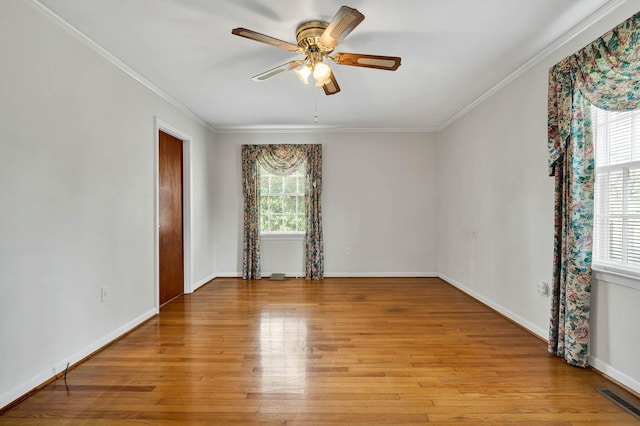 2408 Peerless Rd NW, Cleveland, TN 37311 - empty room featuring light wood-type flooring, visible vents, a ceiling fan, and crown molding