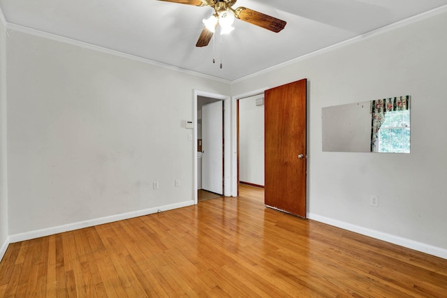 2408 Peerless Rd NW, Cleveland, TN 37311 - spare room featuring light wood-style flooring, baseboards, ceiling fan, and ornamental molding