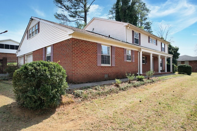 2408 Peerless Rd NW, Cleveland, TN 37311 - view of front facade with brick siding and a front lawn