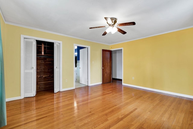 2408 Peerless Rd NW, Cleveland, TN 37311 - unfurnished bedroom with light wood-style flooring, baseboards, a closet, and ornamental molding