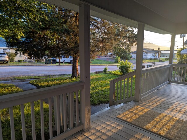 2811 E 26th St, Chattanooga, TN 37407 - wooden porch with a residential view